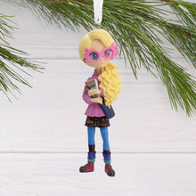Load image into Gallery viewer, Luna Lovegood Harry Potter Decorative ornament of a girl with pink glasses and a book, hanging on a branch.