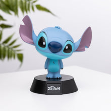 Load image into Gallery viewer, Stitch icon light Blue animated character figure on a black base with 'Disney Stitch' branding, against a light background.