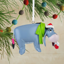 Load image into Gallery viewer, Christmas ornament of a donkey with a Santa hat and green cape on a branch.