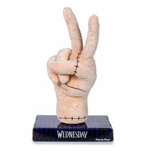 Load image into Gallery viewer, The Thing Plush hand making a peace sign on a 'Wednesday' bookend with a white background