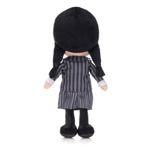 Load image into Gallery viewer, Wednesday Plush toy with black hair and striped dress on a white background rear view
