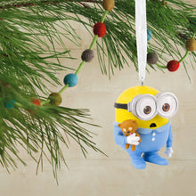 Load image into Gallery viewer, Minion Christmas ornament with a teddy bear on a tree branch