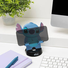 Load image into Gallery viewer, Stitch phone stand on a desk with a computer and plant in the background