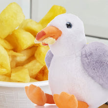 Load image into Gallery viewer, Plush toy seagull in front of basket of chips