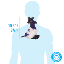 Load image into Gallery viewer, A Sussie plush toy with a white body, purple neck and head, and black feet is shown against a light blue human silhouette to indicate size. Blue text on the left reads 10.5" / 27cm.