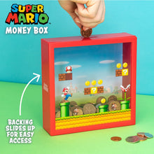 Load image into Gallery viewer, Super Mario Money Box showing hand putting coins in
