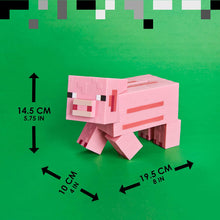 Load image into Gallery viewer, Minecraft Pig Money Bank on green background showing size 19.5cm x 10cm x 14.5cm