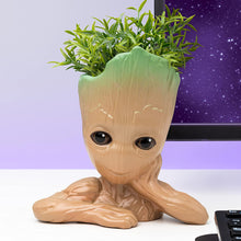 Load image into Gallery viewer, Groot Plant Pot Pen Holder with plant and purple Marvel background