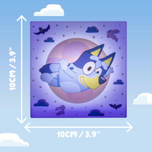 Load image into Gallery viewer, Illustration of a cartoon character on a purple background with measurements indicated.

