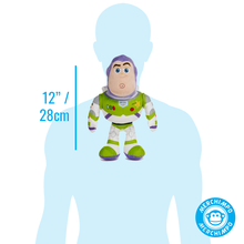 Load image into Gallery viewer, A Buzz Lightyear plush toy centered on a light blue human silhouette, with a vertical measurement marker reading 12" / 28cm and a circular Merchimpo logo in the lower right corner.
