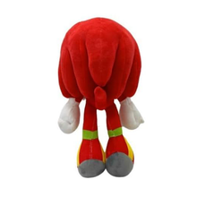 Load image into Gallery viewer, Sonic Friends Knuckles Red plush toy with white paws and gray feet on a white background rear view
