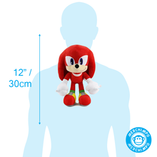 Load image into Gallery viewer, Sonic Friends Knuckles Red plush toy with white accents on a blue silhouette, showing its size in inches and centimeters.
