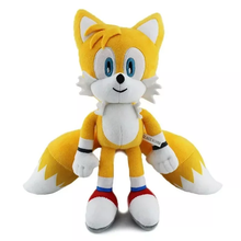 Load image into Gallery viewer, Sonic Friends Tails Plush toy of a fox character with yellow fur and blue eyes on a white background
