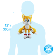 Load image into Gallery viewer, Sonic Friends Tails  Plush toy with dimensions on a transparent figure, featuring the Merchimpo brand.
