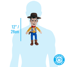 Load image into Gallery viewer, A small Woody-style cowboy plush figure centered on a light blue human silhouette, with blue text reading 12" / 28cm and a circular 'Merchimpo' logo in the lower right.

