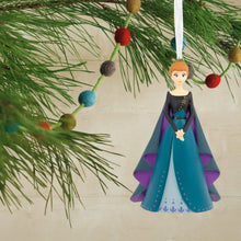 Load image into Gallery viewer, Ornament of a character in a blue dress hanging on a Christmas tree.
