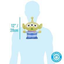Load image into Gallery viewer, A small green alien toy on a light blue human silhouette, with a vertical measurement marker reading 12" / 28cm. A circular 'Merchimpo' logo appears in the bottom right corner.
