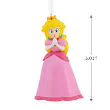 Load image into Gallery viewer, Princess Peach Character figurine with pink dress and yellow hair, standing on a white background with height measurement.
