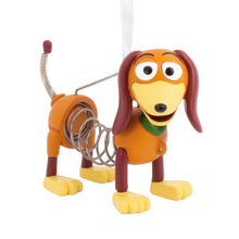 Load image into Gallery viewer, Toy Story Slinky Dog Toy figure of a dog with a spring on a white background 
