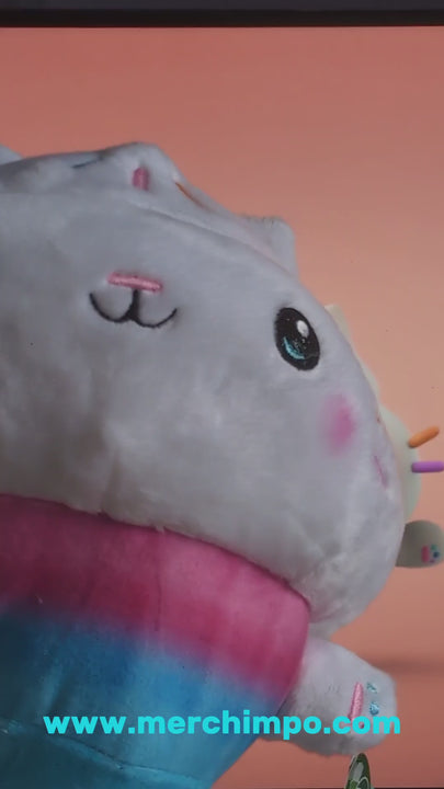 Video of Cakey Cat Soft Plush Toy being shown off in front of Cakey Cat song from Gabbys Dollhouse