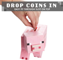 Load image into Gallery viewer, Minecraft Pig Money Bank on white background with hand dropping coins in from above

