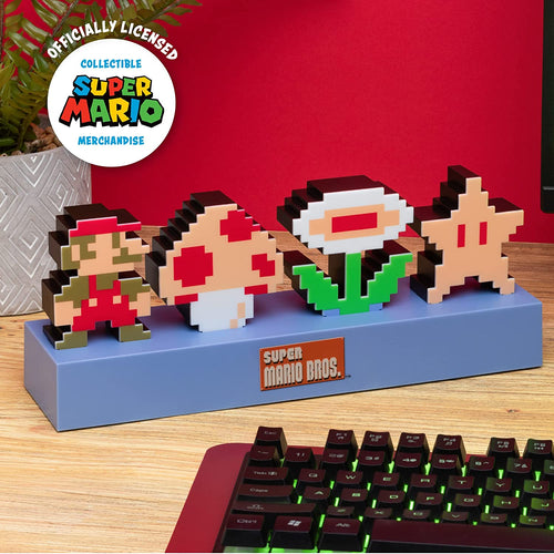 Super Mario Bros. Icons Light sitting on desk with keyboard and offcially licensed Super Mario Collectible Merchandise logo