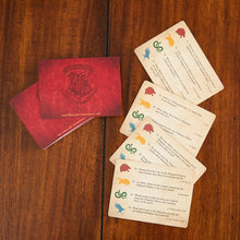Load image into Gallery viewer, Harry Potter Hogwarts Triva Quiz Game cards and box on wooden table
